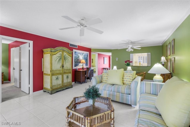 living room with ceiling fan, light tile patterned flooring, and ornamental molding