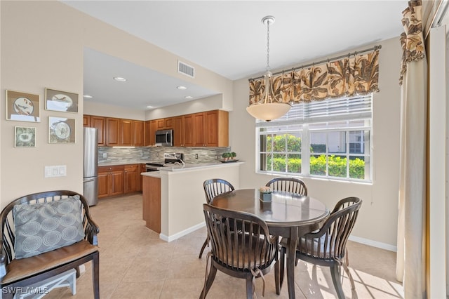 dining room with light tile patterned floors