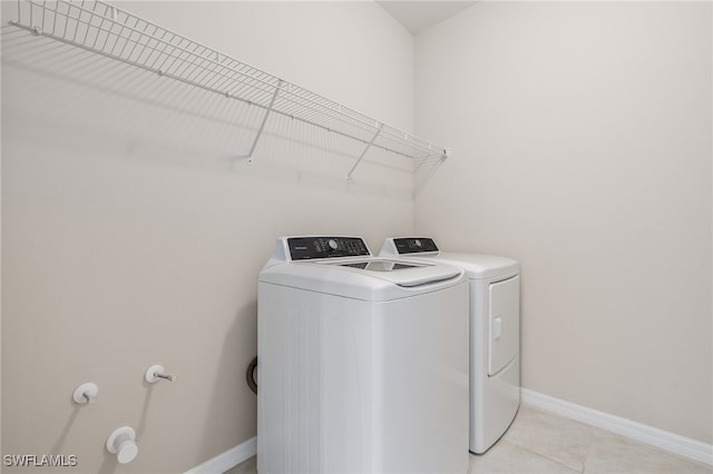 laundry room with washing machine and dryer