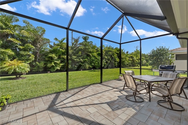 view of patio / terrace with glass enclosure