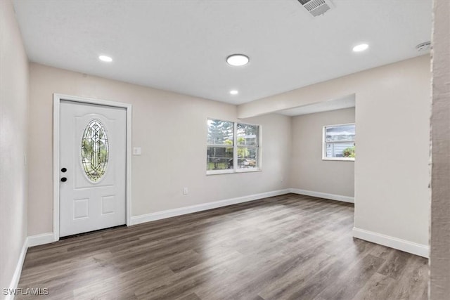 foyer entrance featuring dark hardwood / wood-style floors