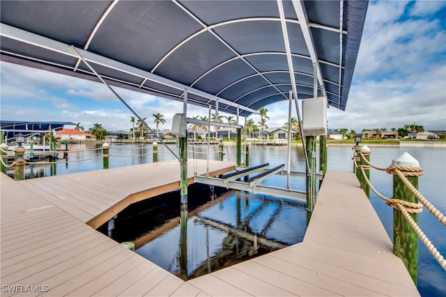 dock area with a water view