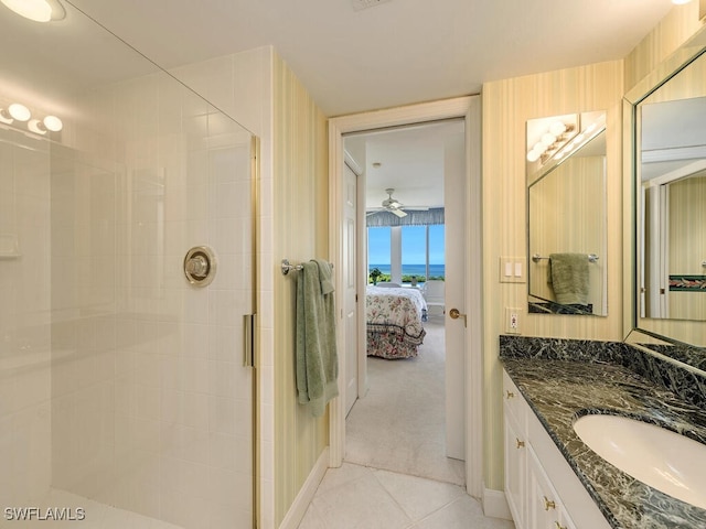 bathroom featuring vanity, tile patterned floors, an enclosed shower, and ceiling fan