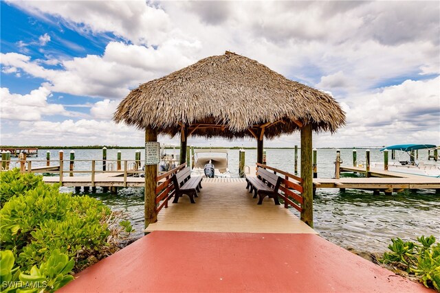 dock area featuring a gazebo and a water view