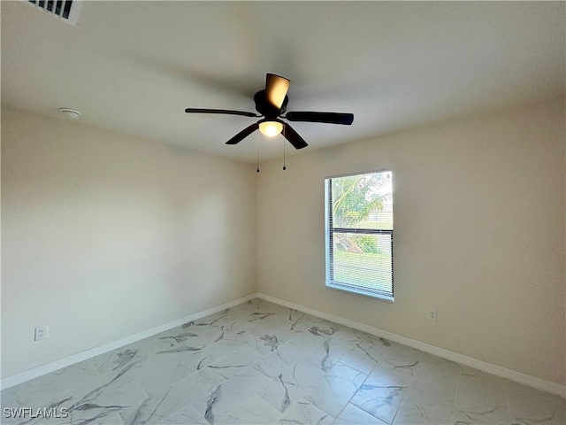 unfurnished room with ceiling fan