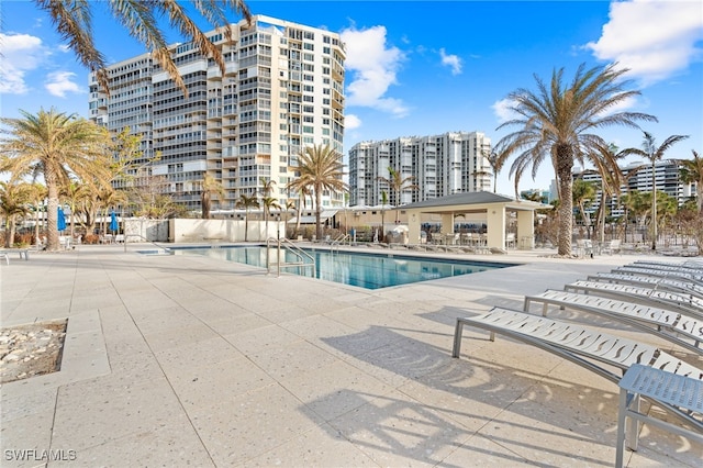 community pool featuring a patio area