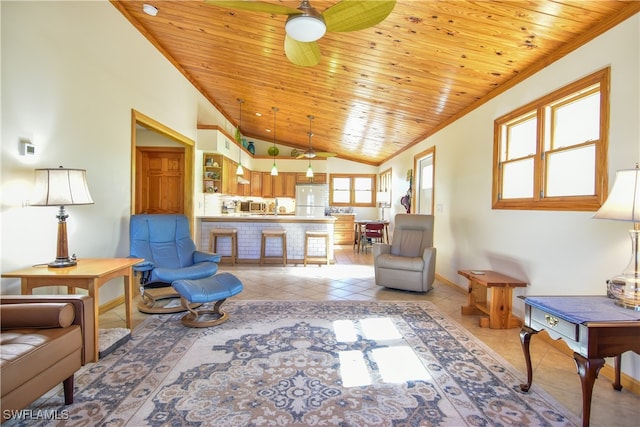 tiled living room with ornamental molding, lofted ceiling, ceiling fan, and wooden ceiling