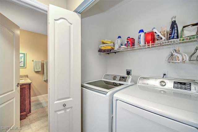 laundry area with laundry area and washer and dryer