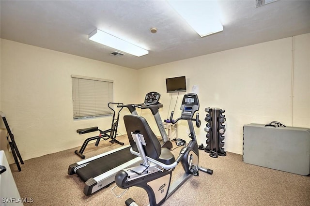 workout area featuring visible vents