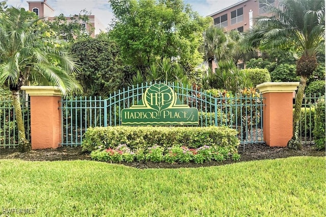 community sign with a yard