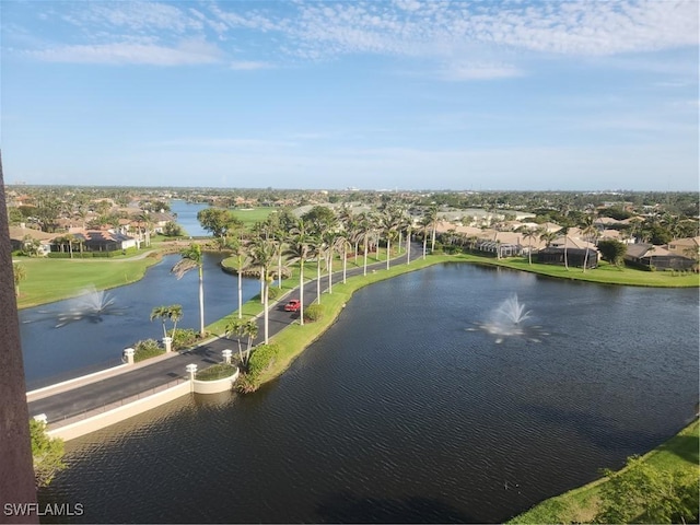 bird's eye view featuring a residential view and a water view