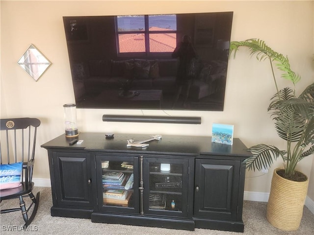 interior space featuring baseboards