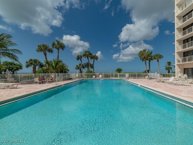 view of swimming pool with a patio area