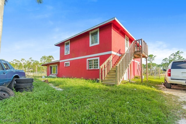 view of property exterior featuring a yard