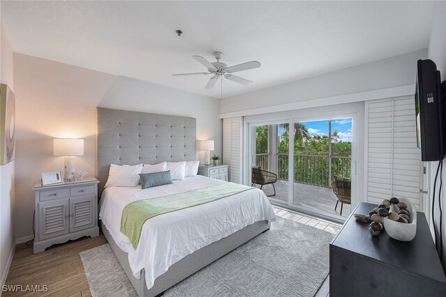 bedroom with hardwood / wood-style floors, ceiling fan, and access to exterior