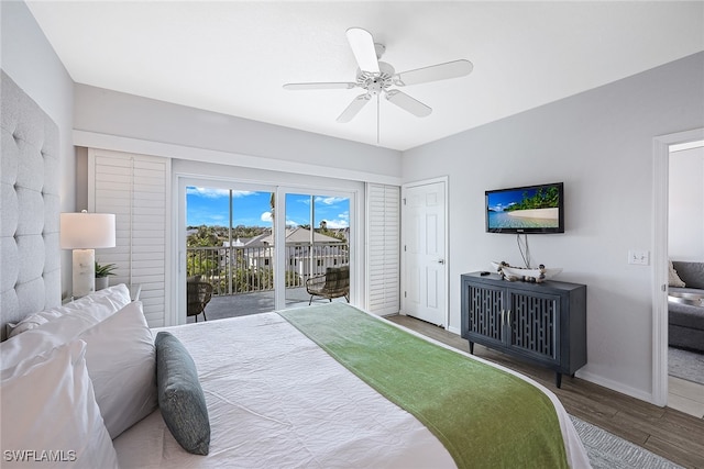 bedroom featuring ceiling fan, dark wood-type flooring, and access to outside