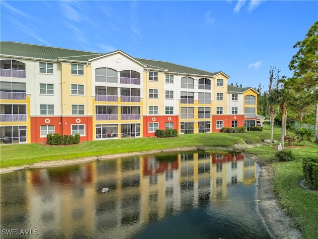 view of building exterior with a water view