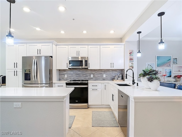 kitchen with white cabinetry, sink, and appliances with stainless steel finishes