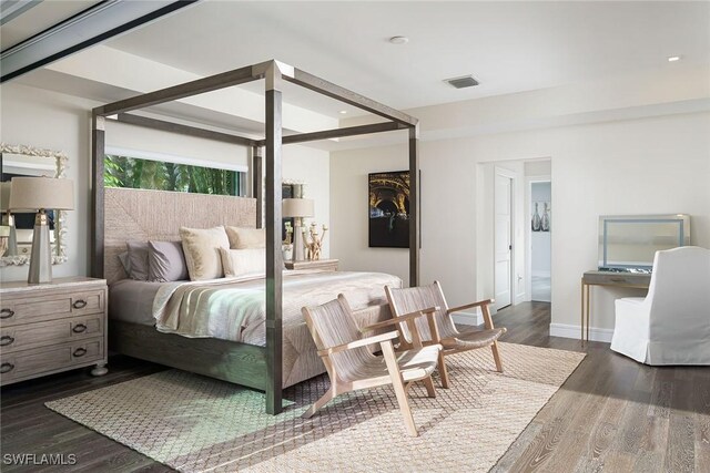 bedroom featuring dark wood-type flooring