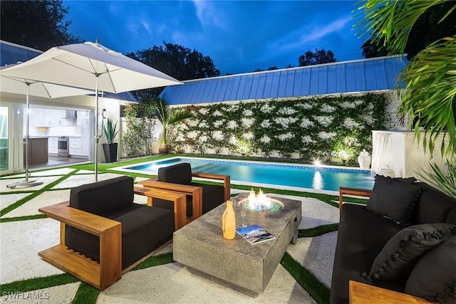 view of pool featuring a patio area and an outdoor hangout area