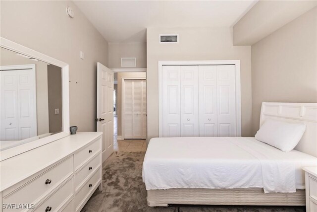 bedroom with light carpet