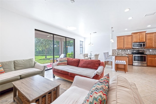 living room with light tile patterned floors