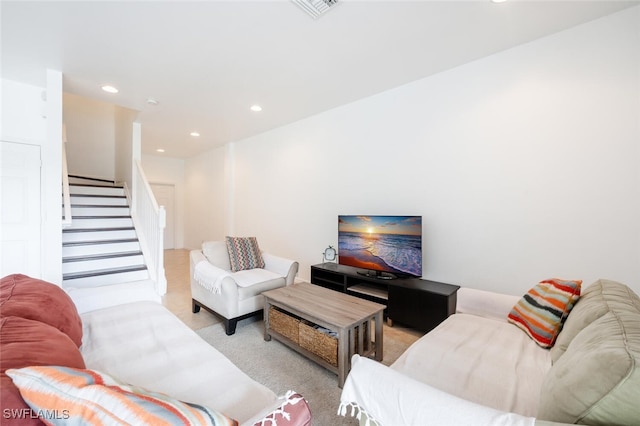 living room featuring light colored carpet