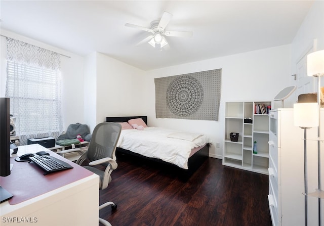 bedroom featuring ceiling fan and dark wood-type flooring