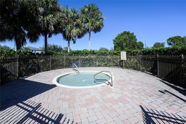 view of pool featuring a patio