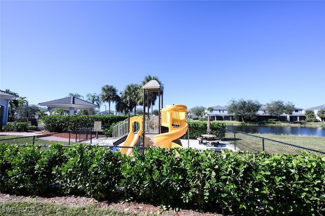 view of play area featuring a gazebo and a water view