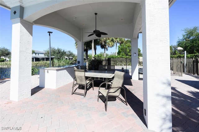 view of patio with ceiling fan