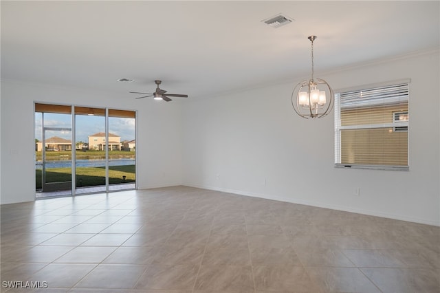 spare room featuring ceiling fan with notable chandelier, crown molding, and light tile patterned flooring