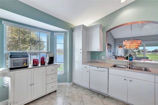 kitchen featuring dishwasher, a healthy amount of sunlight, vaulted ceiling, and sink