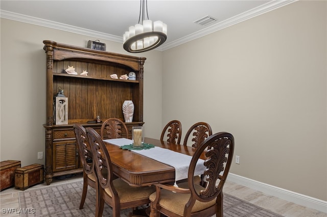 dining area featuring ornamental molding