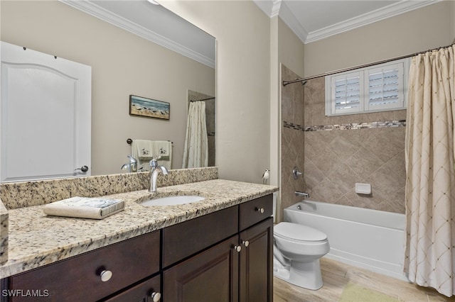 full bathroom featuring ornamental molding, vanity, shower / tub combo with curtain, hardwood / wood-style floors, and toilet