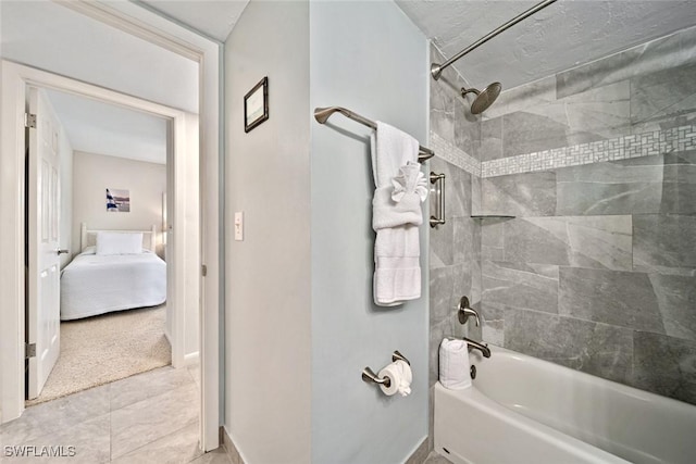 bathroom with tiled shower / bath combo