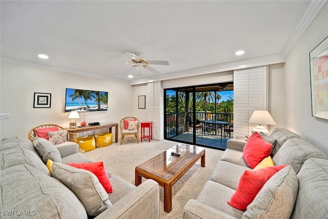 carpeted living room featuring crown molding and ceiling fan