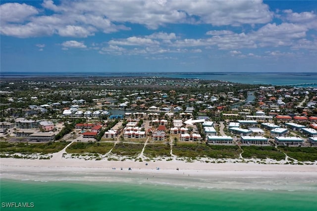 bird's eye view with a beach view and a water view