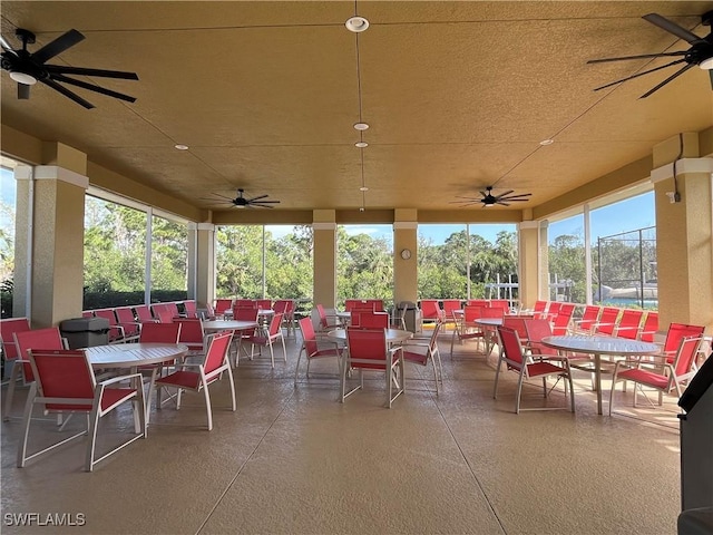 view of patio / terrace with outdoor dining space and a ceiling fan