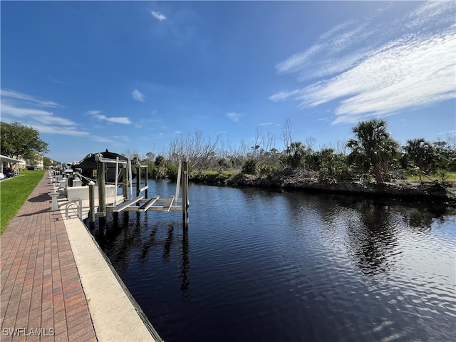 dock area featuring a water view