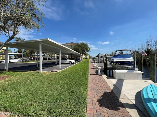 view of dock featuring a yard