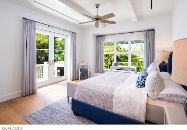 bedroom featuring access to exterior, ceiling fan, french doors, beamed ceiling, and light hardwood / wood-style floors