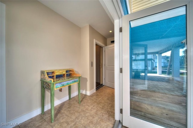 interior space featuring light tile patterned floors