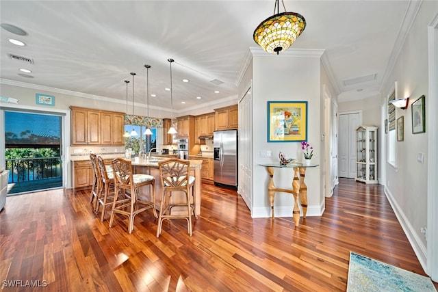 dining area featuring dark hardwood / wood-style floors and crown molding