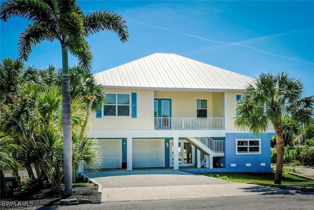 beach home featuring a garage