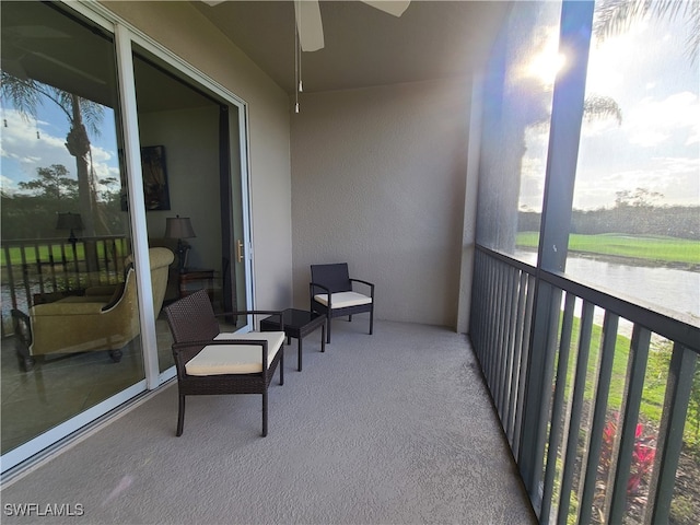 balcony featuring ceiling fan