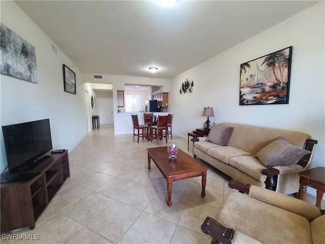 living room featuring light tile patterned floors