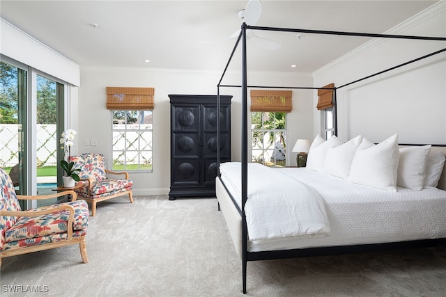 carpeted bedroom featuring crown molding