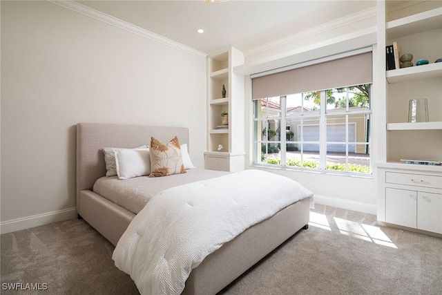 carpeted bedroom with multiple windows and ornamental molding