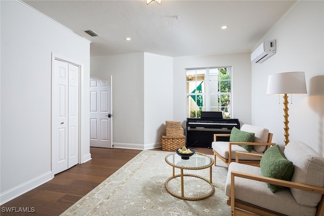 living area with ornamental molding, a wall mounted air conditioner, and dark hardwood / wood-style flooring